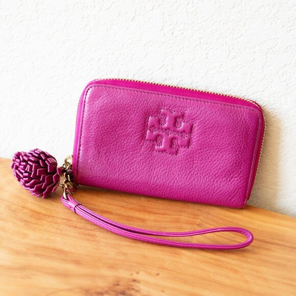 Tory Burch Handbags - TORY BURCH THEA PEBBLED LEATHER ZIP AROUND WALLET WRISTLET WITH TASSEL WILDBERRY